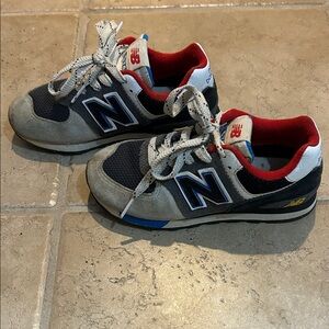 New Balance Black and Gray Sneakers with Red Accents